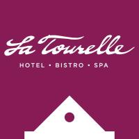 Purple logo that reads La Tourelle Hotel Bistro Spa